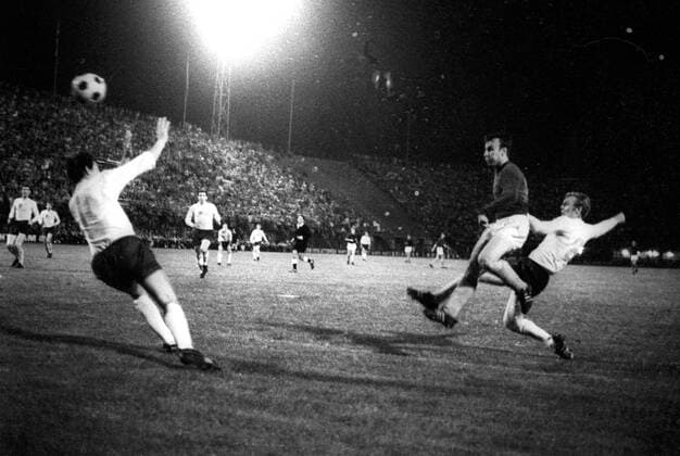 England captain Bobby Moore tackles too late to stop Dzajic of Yugoslavia scoring the goal that gave his side a 1-0 victory in the semi-final of the European Nations Cup, 5th June 1968 - Florence, Italy kbdig quer football goal night 