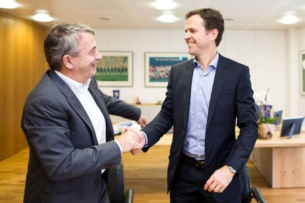 FRANKFURT AM MAIN, GERMANY - OCTOBER 18: DFB President Wolfgang Niersbach and manager Oliver Bierhoff (L-R) shake hands during the announcement of the renewal of Joachim Loews contract at DFB headquarters on October 18, 2013 in Frankfurt am Main, Germany. Oliver Bierhoff; Wolfgang Niersbach