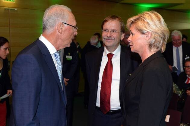 Nürnberg, GERMANY - OCTOBER 24: DFB honor member Franz Beckenbauer (l) talks to DFB vice president Rainer Koch (c) and Germany Women s national team coach Silvia Neid (r) prior to the DFB Bundestag at the NCC Nürnberg on October 24, 2013 in Nürnberg, Germany. Franz Beckenbauer;Rainer Koch;Silvia Neid - Poolfoto