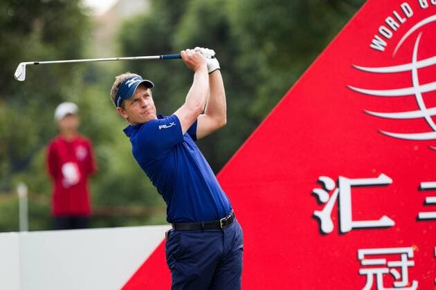 Golfer Luke Donald of England plays a shot in the second round match of the HSBC Champions golf tournament at the Sheshan International Golf Club in Shanghai, China, 1 November 2013. Rory McIlroy tees off at second round of HSBC Champions golf tournament in Shanghai  20131101_04264