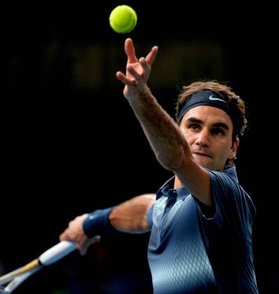 Roger Federer of Switzerland serves during the quarterfinal match of the BNP Paribas 2013 Masters Tennis tournament in Paris, France, on Nov. 1, 2013. (Xinhua Chen Xiaowei) (SP)FRANCE-PARIS-ATP-BNP MASTERS TENNIS 