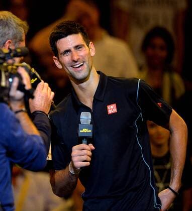 Serbia s Novak Djokovic is interviewed after the quarterfinal match at the BNP Paribas 2013 Masters Tennis tournament in Paris, France, on Nov. 1, 2013. (Xinhua Chen Xiaowei) (SP)FRANCE-PARIS-ATP-BNP MASTERS TENNIS 