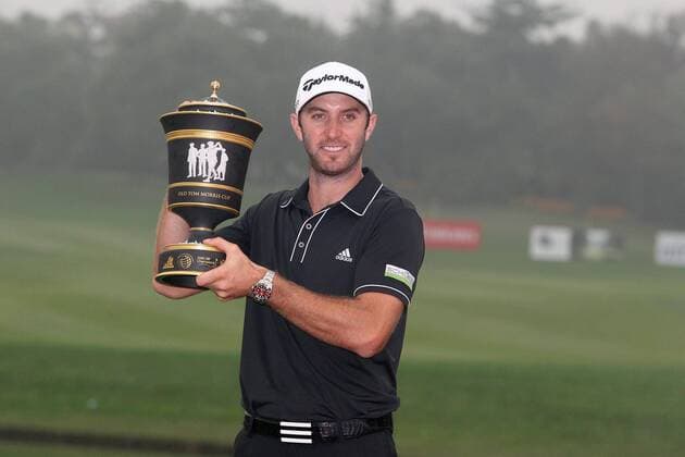 Golfer Dustin Johnson of the United States poses with his champion trophy during the award ceremony of the HSBC Champions golf tournament in Shanghai, China, 3 November 2013. American golfer Dustin Johnson won the champion of the HSBC Champions golf tournament at the Sheshan International Golf Club in Shanghai, China, 3 Nov 2013. Against all the other contenders, Johnson pulled away with power and a clutch putt to win his first World Golf Championship in Shanghai. Dustin Johnson wins championship of HSBC Champions golf tournament in Shanghai  pau905496_05