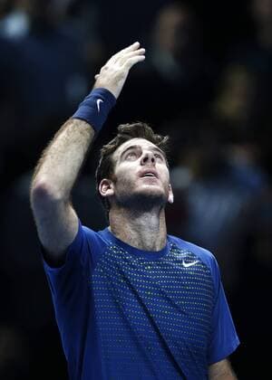 Juan Martin del Potro of Argentina celebrates after the Singles Group B match at the O2 Arena in London, Britain, Nov. 4, 2013. (Xinhua Wang Lili) (SP)BRITAIN-LONDON-TENNIS-ATP FINALS-SINGLES-GROUP B- 