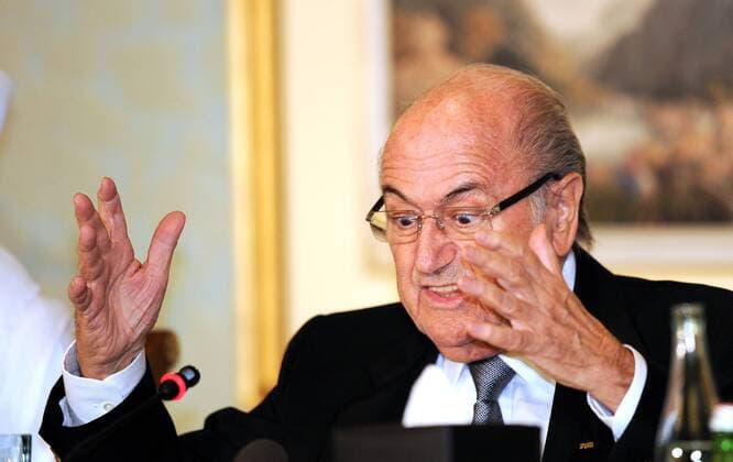 (131109) -- DOHA, Nov. 9, 2013 (Xinhua) -- FIFA President Sepp Blatter answers questions during a Media Briefing in Doha, Qatar on Nov. 9, 2013. (Xinhua Chen Shaojin) (SP)QATAR-DOHA-SOCCER 