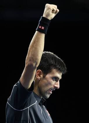 LONDON, Nov. 11, - Novak Djokovic of Serbia celebrates after the Singles Final on day 8 of the Barclays ATP Tennis Herren World Tour Finals at the O2 Arena in London, Britain, Nov. 11, 2013. (Xinhua Wang Lili) (SP)BRITAIN-LONDON-TENNIS-ATP FINALS-DAY 8-SINGLES-FINALS 