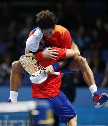 LONDON, Nov. 11, - Spanish David Marrero (bottom) and Fernando Verdasco celebrate after the Doubles Final on day 8 of the Barclays ATP Tennis Herren World Tour Finals at the O2 Arena in London, Britain, Nov. 11, 2013. (Xinhua Wang Lili) (SP)BRITAIN-LONDON-TENNIS-ATP FINALS-DAY 8-DOUBLES-FINALS 