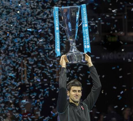 11.11.2013 London, England. Novak Djokovic SRB holds the championship trophy aloft after winning the final of The ATP Tennis Herren World Tour Finals 2013 at the O2 Arena London. xStephenxBartholomewx  ActionPlus20155354