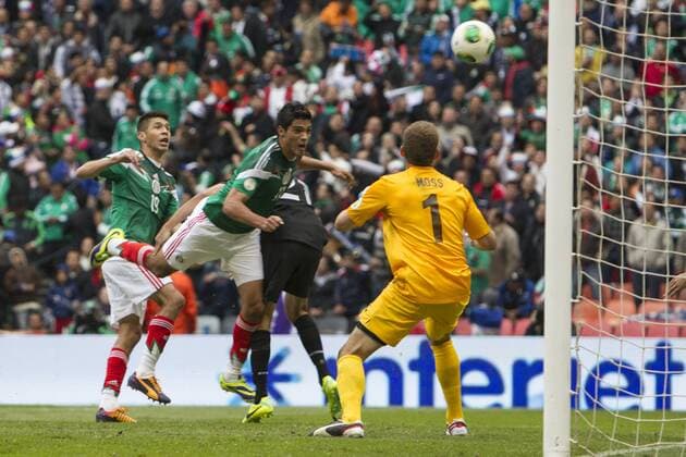 MEXICO CITY, Nov. 13, 2013 (Xinhua) -- Mexico s Raul Jimenez (C) scores during the FIFA 2014 World Cup intercontinental playoff 1st leg qualification match between Mexico and New Zealand, at the Azteca stadium, in Mexico City, capital of Mexico, on Nov. 13, 2013. (Xinhua Camilo Monaco) (liu) (ce) (SP)MEXICO-NEW ZEALAND-WORLD CUP QUALIFICATION MATCH 