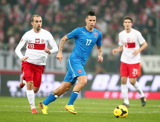Wroclaw, 15.11.2013 - Friendly 2013 - Poland vs Slovakia - ADRIAN MIERZEJEWSKI (Poland) MAREK HAMSIK (Slovakia) -  131115MIN028