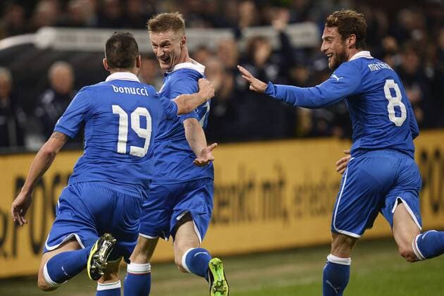 Ignazio Abate (C) with Leonardo Bonucci (L) and Claudio Marchisio (R), Goal celebration 1-1 Milano, 15.11.2013 - Friendly 2013 - Italy vs Germany - andreaxstaccioli