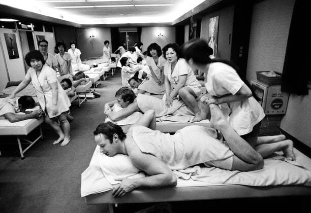 1972 Winter Olympics The Great Britain men s luge team get massages in a bathouse in Sapporo, Japan. Pictured nearest the camera is Jeremy Palmer-Tomkinson. Palmer-Tomkinson s father James and brother Charles were also Winter Olympians, while his neice Tara later became famous as a socialite. Michel de Carvalho, third back on right, had enjoyed a brief Hollywood film career (as Michel Ray) including the role of the Arab boy Faraj in Lawrence of Arabia . His wife Charlene is the daughter of the Dutch brewing magnate Freddy Heineken, and she inherited the family fortune in 2002. 
