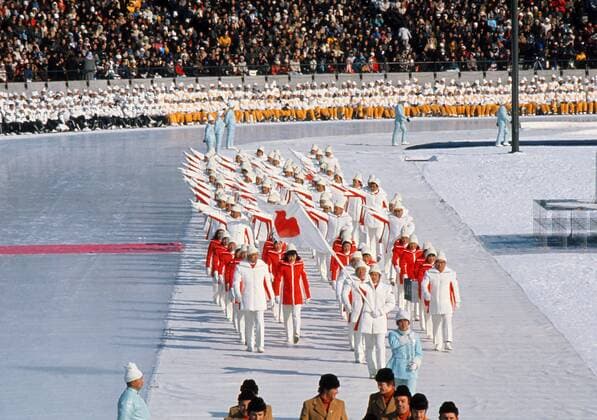 1972 Sapporo Olympics - Opening Ceremony The Japan team parade with their flag at Makomanai Speed Skating Rink. 03 02 1972 