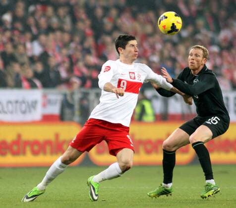 19.11.2013, Poznan, Football , International friendly Poland - Ireland; Robert Lewandowski (POL) , Paul Green (IRL) POZNAN 2013.11.19 FOOTBALL - INTERNATIONAL FRIENDLY FOOTBALL MATCH POLAND - IRELAND.  20131119awj_296