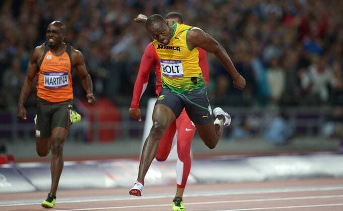 Sonntag 05.08.2012, Olympische Spiele 2012 in London, 100m Lauf Männer Finale, Jamaica s Usain Bolt (Jamaika) DeFodi018