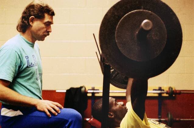 Athletics - Ben Johnson training session - Toronto Metropolitan Hotel Canada s Ben Johnson, serving a suspension for his failed drugs test at the Seoul Olympics, trains in the weights room with coach Loren Seagrave for his comeback race that took place the next month. 10 12 1990 