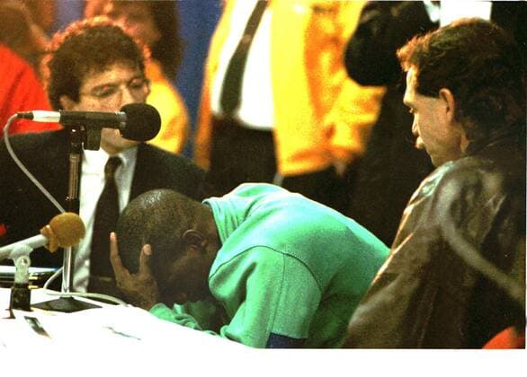 Athletics - 1991 Hamilton Spectator Indoor Games - Ben Johnson Comeback Race Ben Johnson during a press conference after making his return to the track after serving his drugs suspension after failing the test after the Seoul Olympic 100m final. His coach Loren Seagrave is right. At the Copps Coliseum Johnson was greeted by the largest crowd to ever attend an indoor Canadian track and field event. More than 17,000 saw him finish second in the 50 metres in 5.77 seconds. 11 01 1991 
