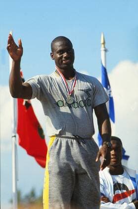 Athletics - 1988 Canada Olympic Trails 100m winner Ben Johnson receives his medal on the podium. 10 08 1988 