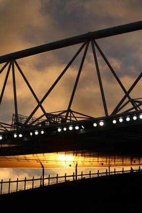 Arsenal FC London . . London, UK . . 23.11.2013 The sun is reflected underneath the roof of the Emirates Stadium. 