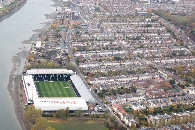 Aerial shot of Craven Cottage Football Stadium - home of Fulham FC. EDITORIAL USE ONLY. No use with unauthorised audio, video, data, fixture lists, club league logos or live services. Online in-match use limited to 120 images, no video emulation. No use in betting, games or single club league player publications.