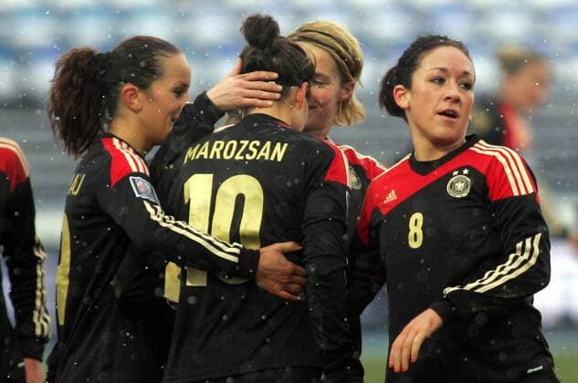 27.11.2013 Osijek(Croatia) Croatia-Germany FIFA World Cup qualify women football Fatmire Bajramaj(L) with Dzsenifer Marozsan(2L) with Saskia Bartusiak(3L) and Nadine Kessler(r)Germany celebrate during match : 