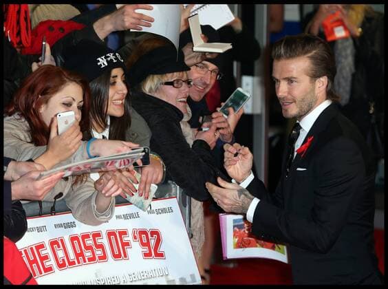 David Beckham signs autographs as he arrives at the The Class of 92 premiere in London, Sunday, 1st December 2013. Picture by Stephen Lock i-Images StephenxLockx xi-Images  IIM-0959-0046
