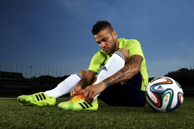 Dani Alves (BRA) präsentiert den Adidas brazuca - offizieller Spielball des FIFA World Cup in Brasilien