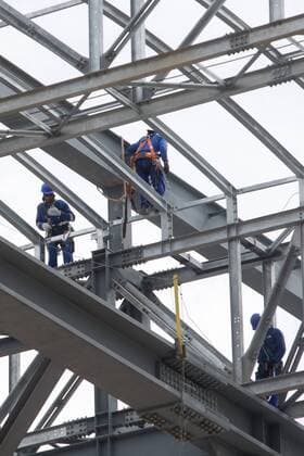 Workers work at the construction site of Arena da Baixada in Curitiba, Brazil, Dec. 14, 2013. Arena da Baixada, which has 43,000 seats, will host 4 group matches during the 2014 FIFA World Cup. (Xinhua Xu Zijian) (SP)BRAZIL-CURITIBA-ARENA DA BAIXADA-VISIT 