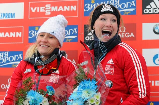 14 December 2013: Canada 1 driven by Kaillie Humphries (L) with brakeman Heather Moysecelebrates (R) celebrate their first place finish on the track at the Olympic Sports Complex in Lake Placid, NY in the Women s bobsled World Cup. BOBSLED: DEC 14 FIBT World Cup Icon749131214036 EDITORIAL USE ONLY
