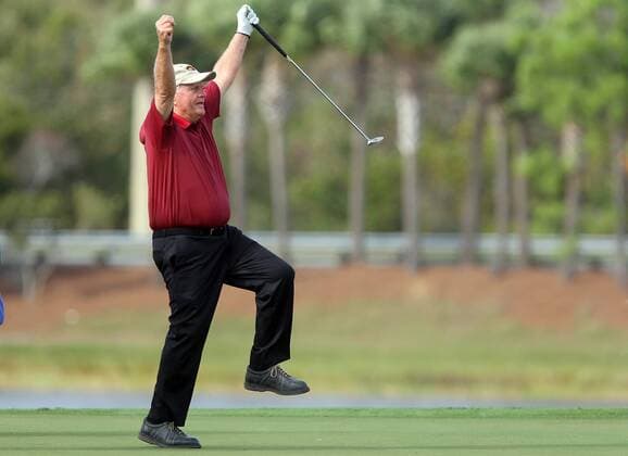 14 DEC 2013: Jack Nicklaus raises his arms to celebrate making a putt for the fans during the first round of the PNC Father-Son Challenge at The Ritz-Carlton Golf Club in Orlando, Florida. GOLF: DEC 14 PNC Father-Son Challenge - 1st Round Icon357131214220 EDITORIAL USE ONLY