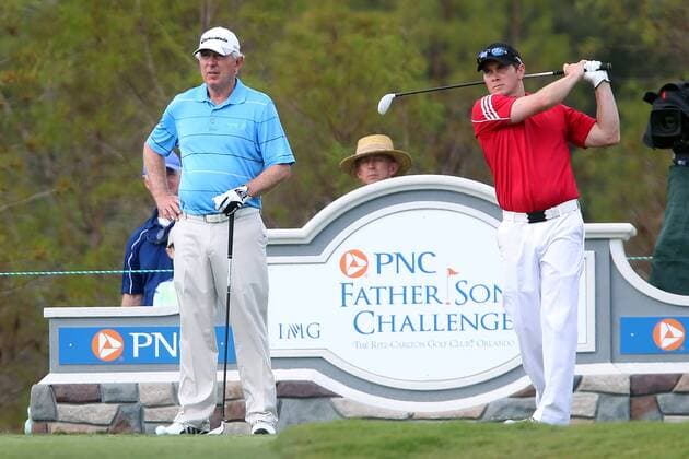 14 DEC 2013: Hale Irwin watches his son, Steve Irwin, tee off during the first round of the PNC Father-Son Challenge at The Ritz-Carlton Golf Club in Orlando, Florida. GOLF: DEC 14 PNC Father-Son Challenge - 1st Round Icon357131214258 EDITORIAL USE ONLY