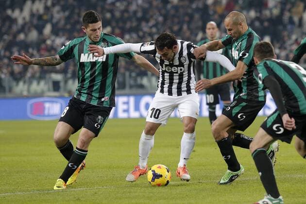 Carlos Tevez Juventus, Luca Marrone (L),Paolo Bianco Sassuolo, Torino 15-12-2013, Juventus Stadium, Football Calcio 2013 2014 Serie A, Juventus Turin vs Sassuolo Calcio: MarcoxBertorello