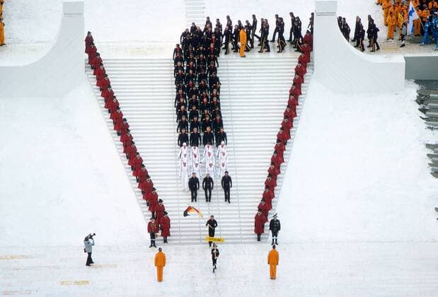 Opening Ceremony - 1976 Innsbruck Winter Olympics Wolfgang Zimmerer is the flag-bearer leading the West Germany team at the Bergiselschanze, Bergisel, Innsbruck, Austria. 04 02 1976 