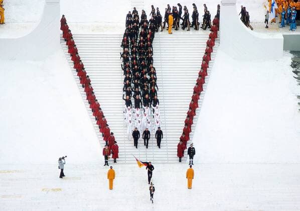 Opening Ceremony - 1976 Innsbruck Winter Olympics Wolfgang Zimmerer is the flag-bearer leading the West Germany team at the Bergiselschanze, Bergisel, Innsbruck, Austria. 04 02 1976 