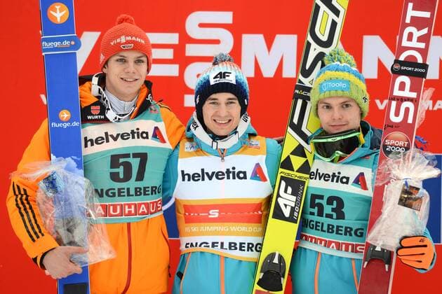SKI NORDISCH - FIS WC Engelberg ENGELBERG,SCHWEIZ,22.DEZ.13 - SKI NORDISCH, SKISPRINGEN - FIS Weltcup der Herren, Siegerehrung. Bild zeigt Andreas Wellinger (GER), Kamil Stoch und Jan Ziobro (POL). 