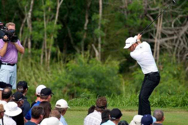 Jan. 3, 2014 - Kapalua, Hawaii, USA - January 3, 2014 - Dustin Johnson hits his tee shot during the first round of the 2014 Hyundai Tournament of Champions held at the Kapalua Plantation Course on the island of Maui in Hawaii. PGA Golf Herren Tour: Hyundai Tournament of Champions JAN03 - ZUMAc04