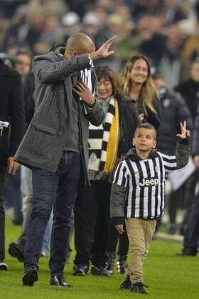 Former Juventus player David Trezeguet and son Noraan waves to the fans.Torino 05-01-2014 Juventus Stadium - Football Calcio Serie A 2013 2014 Juventus Turin vs AS Rom andreaxstaccioli