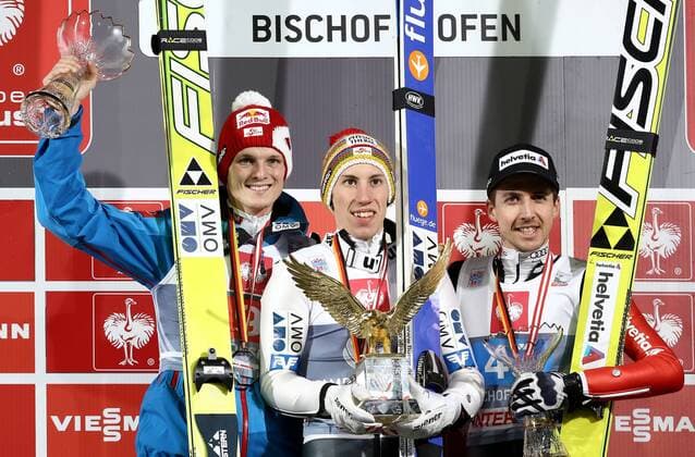 SKI NORDISCH - FIS WC Bischofshofen, Vierschanzentournee BISCHOFSHOFEN,AUSTRIA,06.JAN.14 - SKI NORDISCH, SKISPRINGEN - FIS Weltcup der Herren, Vierschanzen-Tournee, Siegerehrung. Bild zeigt den Jubel von Thomas Morgenstern, Thomas Diethart (AUT) und Simon Ammann (SUI). Keywords: Gesamtsieg, Trophäe, Medaille. 