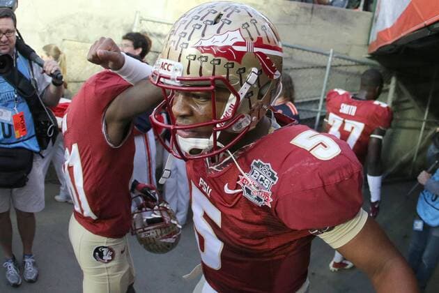 Jan. 6, 2014 - Pasadena, California, United States of America - Quarterback Jameis Winston 5 of the Florida State Seminoles pumps players up as they head into the locker room..During the BCS Championship Game in Pasadena, California. Between the 1 ranked Florida State Seminoles and the 2 ranked Auburn Tigers. The final game of the Bowl Championship Series, before moving to a four team playoff system. NCAA College League USA Football 2014 - Jan 6 - BCS Championship Game - Florida St vs Auburn - ZUMAl30