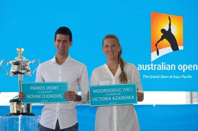Defending champions Victoria Azarenka (R) of Belarus and Novak Djokovic of Serbia pose during the official draw of the Australian Open tennis championship in Melbourne, Australia, Jan. 10, 2014. (Xinhua Bai Xue) (SP)AUSTRALIA-MELBOURNE-TENNIS-AUSTRALIA OPEN-DRAW 