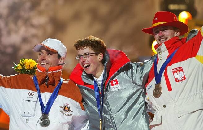 Olympische Winterspiele 2002 Salt Lake City 10.02.2002 Siegerehrung Skispringen 90 Meter Schanze: Sieger Simon Ammann (Mitte, Schweiz), Zweiter Sven Hannawald (Deutschland) und Dritter Adam Malysz (Polen) 