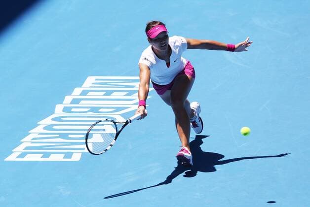 (140113) -- MELBOURNE, Jan. 13, 2014 (Xinhua) -- Li Na of China returns the ball during her women s singles first round match at 2014 Australian Open tennis tournament in Melbourne, Australia, Jan. 13, 2014. Li Na won 2-0. (Xinhua Xu Yanyan) (SP)AUSTRALIA-MELBOURNE-TENNIS-AUSTRALIA OPEN 