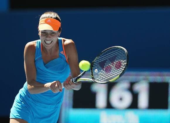 (140113) -- MELBOURNE, Jan. 13, 2014 (Xinhua) -- Serbia s Ana Ivanovic plays a shot during their women s singles match on day one of the 2014 Australian Open tennis tournament in Melbourne on January 13, 2014. (Xinhua Xu Yanyan) (SP)AUSTRALIA-MELBOURNE-TENNIS-AUSTRALIA OPEN 