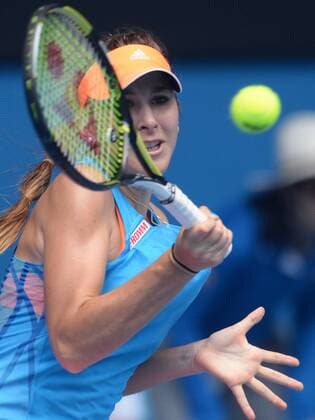(140115) -- MELBOURNE, Jan. 15, 2014 (Xinhua) -- Belinda Bencic of Switzerland hits a returns during her women s singles second round match at the 2014 Australian Open tennis tournament in Melbourne Australia, on Jan. 15, 2014. (Xinhua Li Jundong) (SP)AUSTRALIA-MELBOURNE-TENNIS-AUSTRALIAN OPEN 
