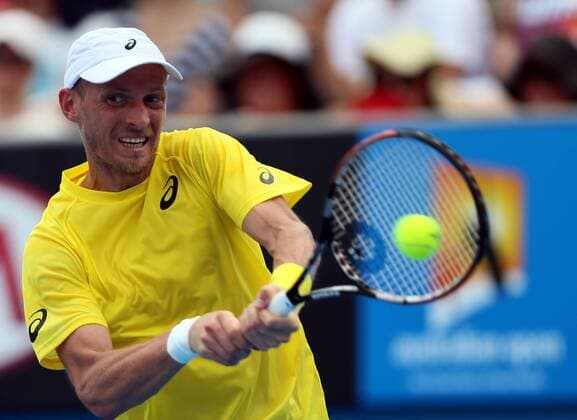 (140115) -- MELBOURNE, Jan. 15, 2014 (Xinhua) -- Nikolay Davydenko of Russia returns a shot in the men s singles first round match at 2014 Australian Open tennis tournament in Melbourne, Australia, Jan. 15, 2014. (Xinhua Li Peng) (SP)AUSTRALIA-MELBOURNE-TENNIS-AUSTRALIAN OPEN 