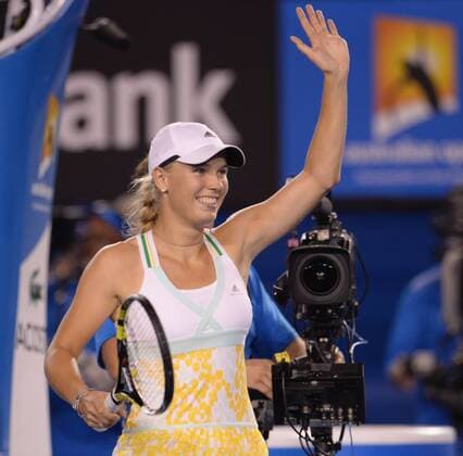(140116) -- MELBOURNE, Jan. 16, 2014 (Xinhua) -- Caroline Wozniacki of Denmark celebrates after winning over Christina McHale of the U.S. during their second round match at the Australian Open tennis championship in Melbourne, Australia, Thursday, Jan. 16, 2014. 