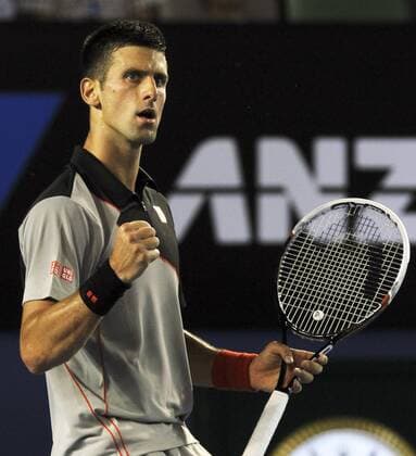(140117) -- MELBOURNE, Jan. 17, 2014 (Xinhua) -- Novak Djokovic of Serbia celebrates a score during the men s singles third round match at 2014 Australian Open tennis tournament in Melbourne, Australia, Jan. 17, 2014. (Xinhua Jin Linpeng) (SP)AUSTRALIA-MELBOURNE-TENNIS-AUSTRALIAN OPEN 