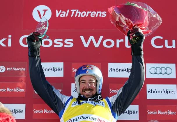 FREE STYLE - FIS WC Val Thorens, Skicross VAL THORENS,FRANKREICH,17.JAN.14 - FREE SKI, FREESTYLE SKIING - FIS Weltcup, Ski Cross, Siegerehrung. Bild zeigt den Jubel von John Teller (USA). Keywords: Trophäe. 