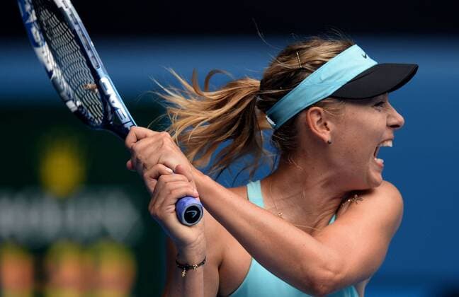 Maria Sharapova of Russia competes during the women s singles 3rd round match at 2014 Australian Open tennis tournament in Melbourne, Australia, Jan. Jan. 18, 2014. (Xinhua Li Jundong) (SP)AUSTRALIA-MELBOURNE-TENNIS-AUSTRALIAN OPEN 