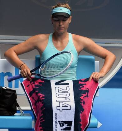 Maria Sharapova of Russia takes a break during the women s singles 3rd round match at 2014 Australian Open tennis tournament in Melbourne, Australia, Jan. Jan. 18, 2014. (Xinhua Li Jundong) (SP)AUSTRALIA-MELBOURNE-TENNIS-AUSTRALIAN OPEN 